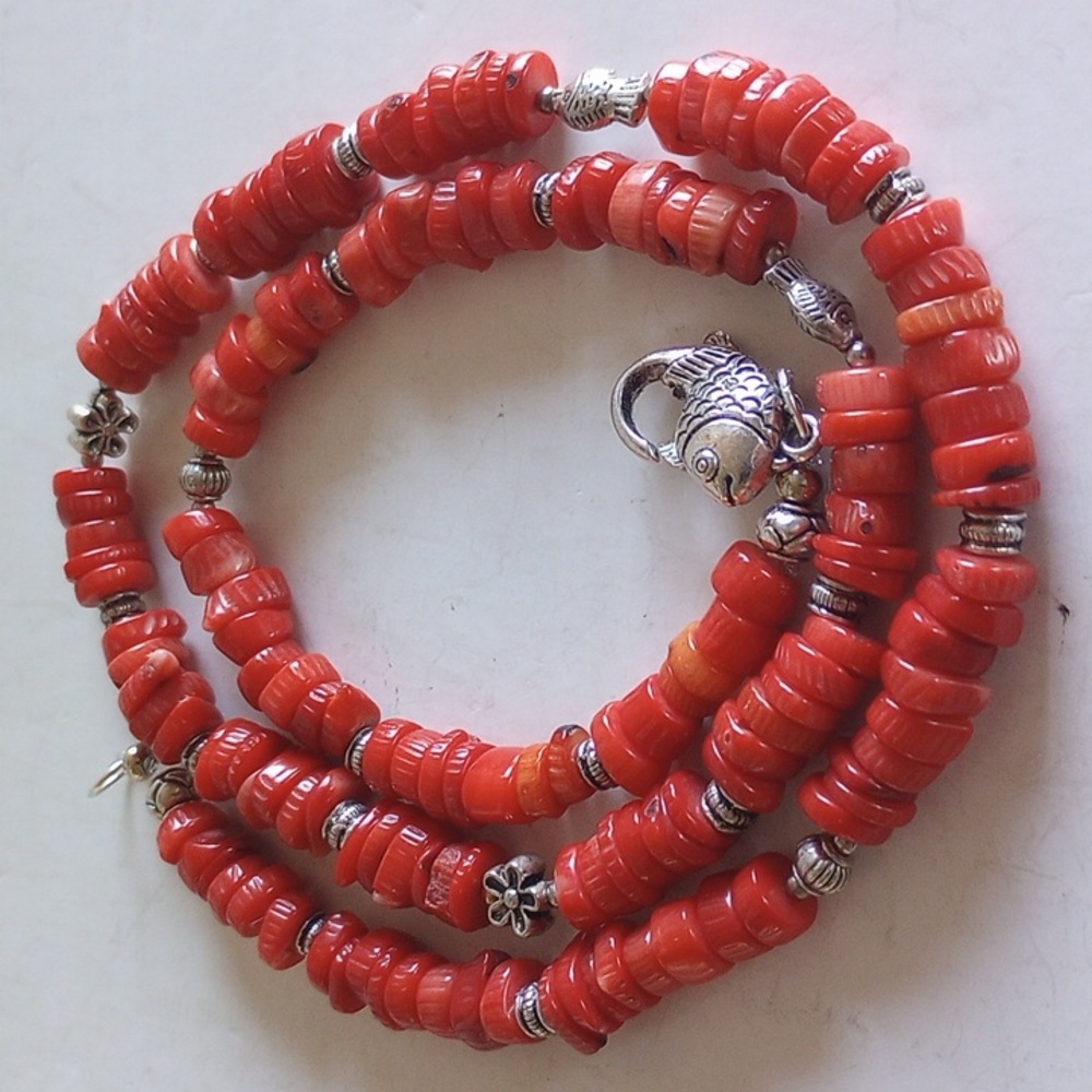 NATURAL RED CORAL HEISHI CUT W/ FIGURAL FISH CLASP